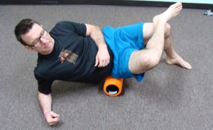 The Grid Foam Roller by Trigger Point Therapy - self massage gluteal muscles.