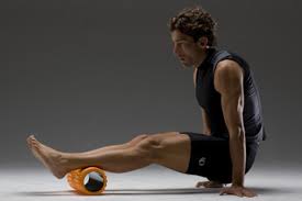 Place foam roller beneath calves. Slowly roll from the ankles to the knees. Plantar fasciitis